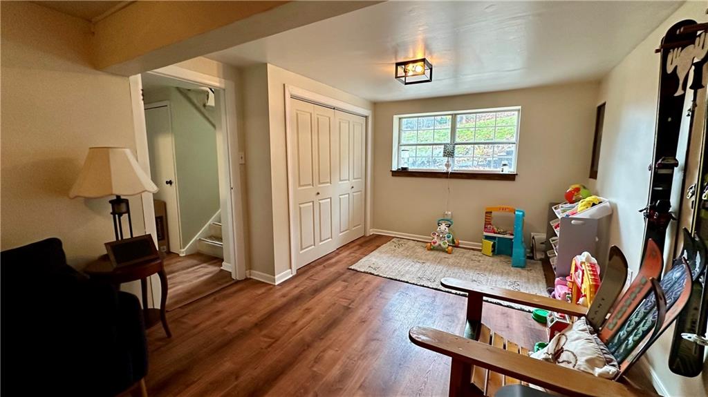 2525 Oakhill Road Gibsonia, PA 15044 - Photo 24 of 36 ENJOY THIS UPDATED FAMILY ROOM WITH LOTS OF CLOSET STORAGE! BEAUTIFUL FLOORS!
