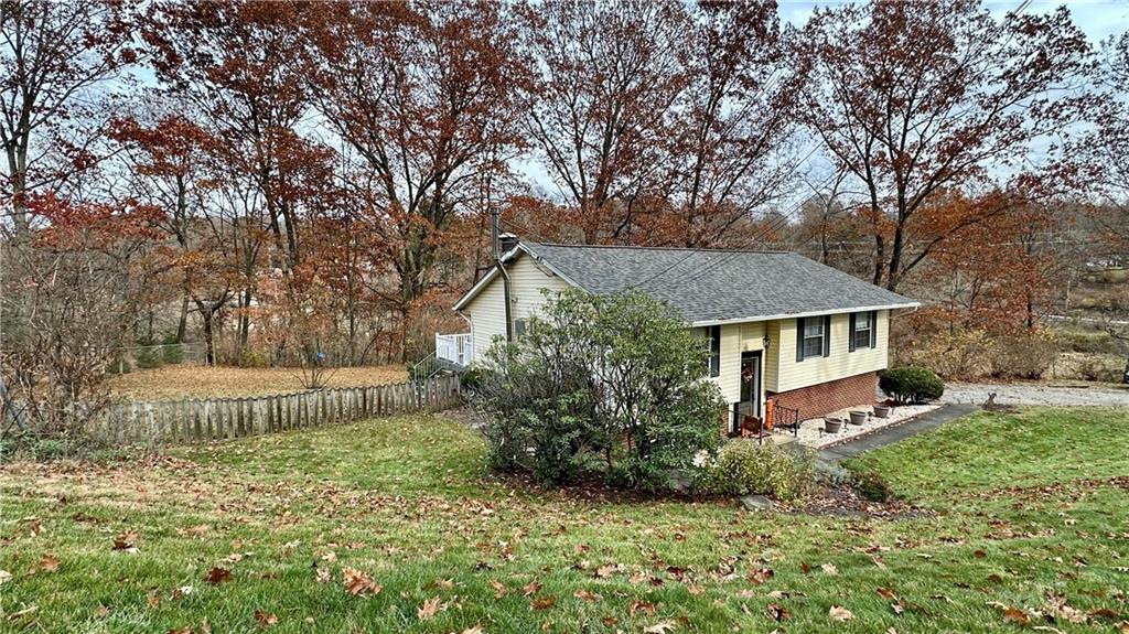 2525 Oakhill Road Gibsonia, PA 15044 - Photo 3 of 36 THIS WONDERFUL HOME SITS ON A LOVELY LOT WITH MATURE TREES AND FENCED REAR YARD.