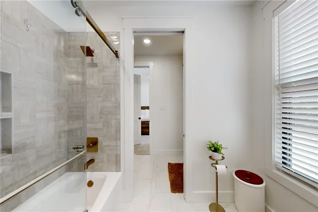 a bathroom with a sink vanity and a mirror
