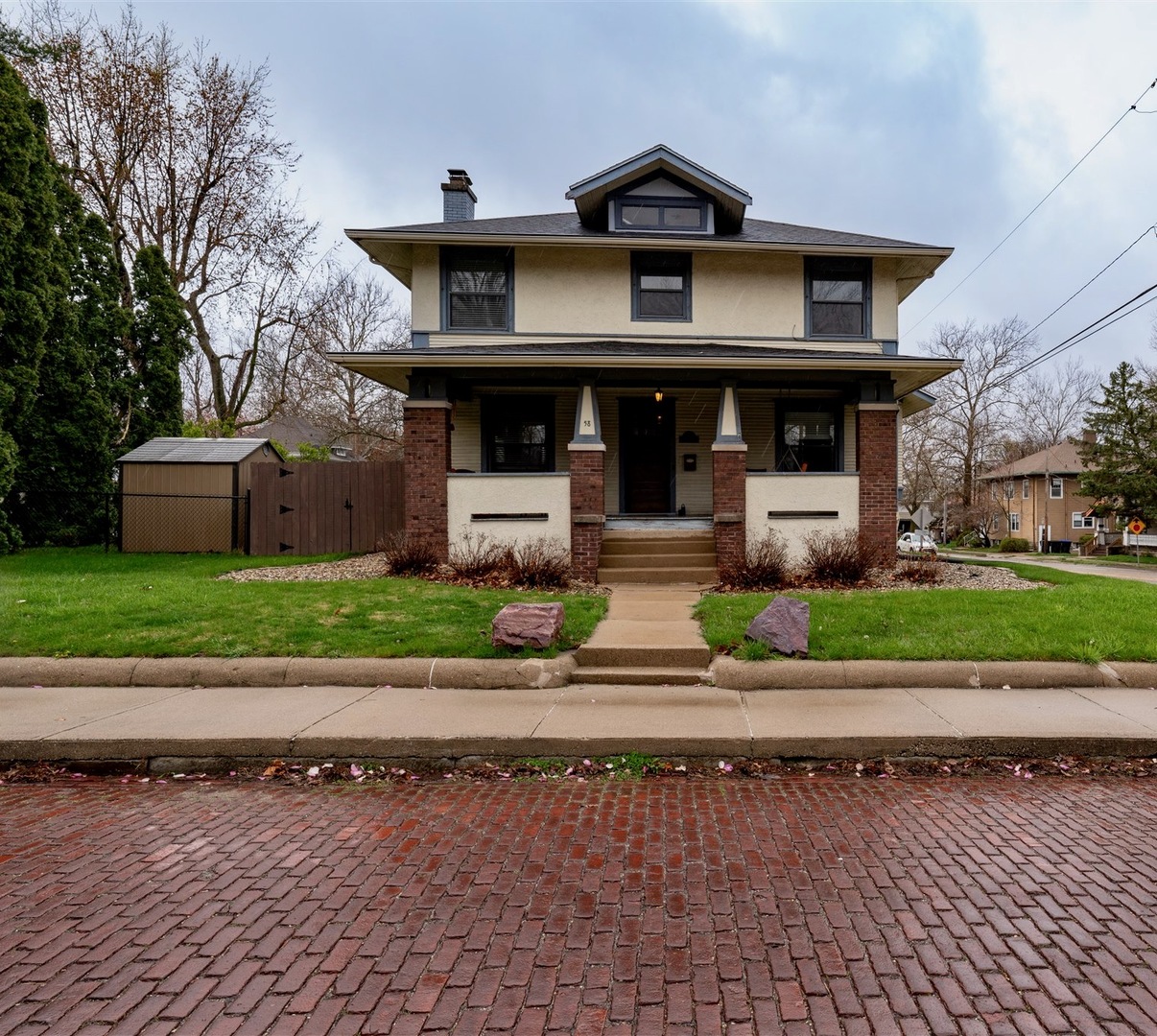 a view of a house with a street