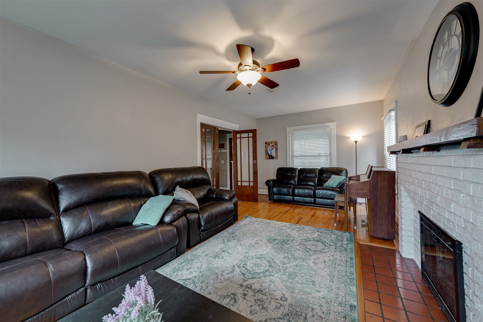 58 White Place Bloomington, IL 61701 - Photo 11 of 38 a living room with furniture and a fireplace