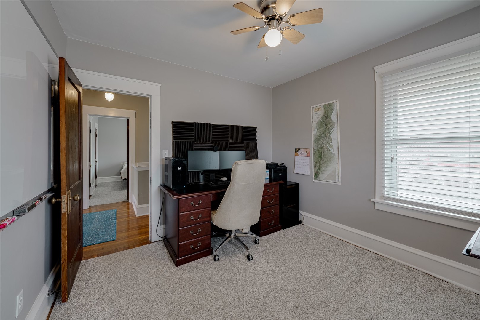 58 White Place Bloomington, IL 61701 - Photo 20 of 38 a view of a workspace with furniture and a window