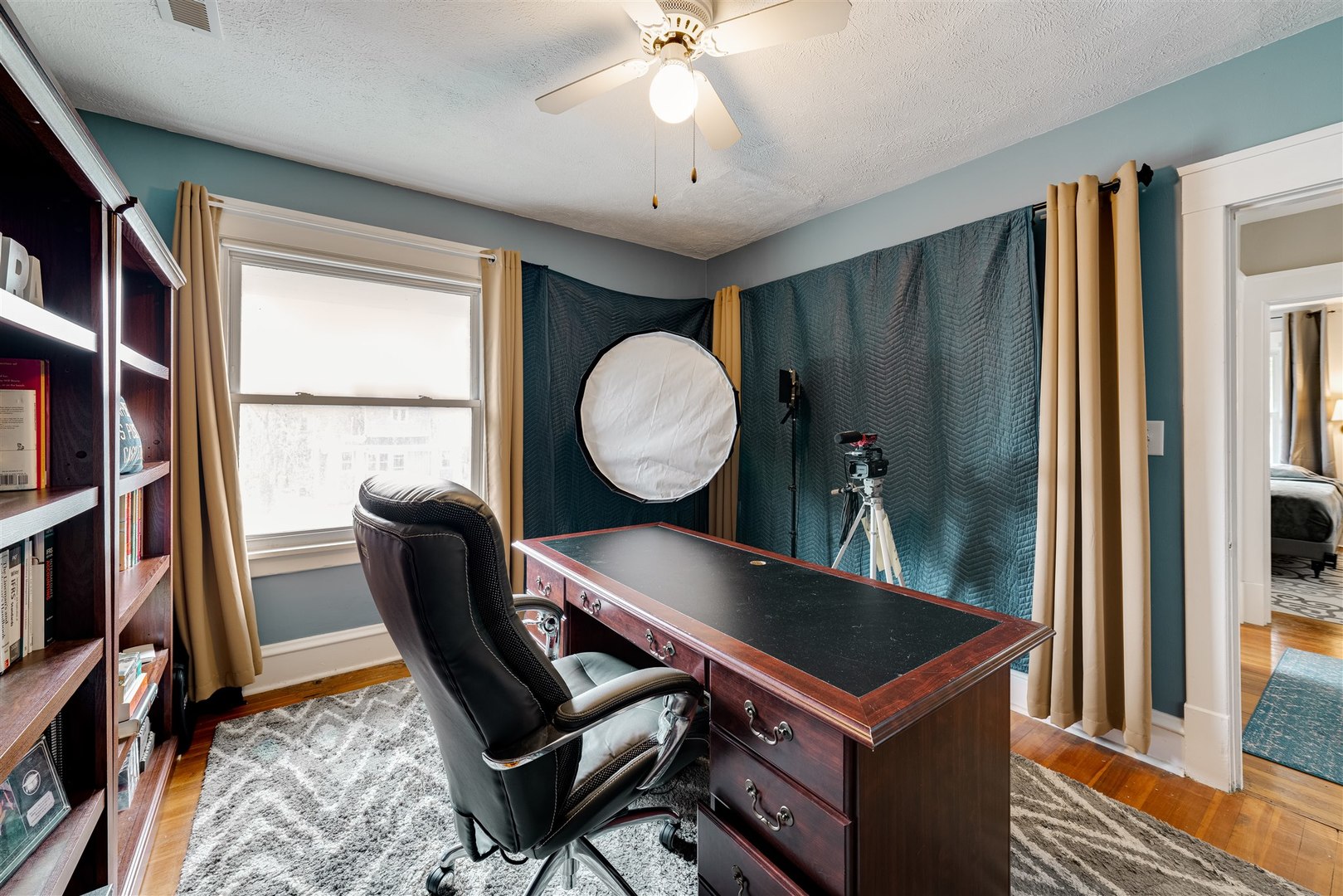 58 White Place Bloomington, IL 61701 - Photo 22 of 38 a living room with furniture and a window