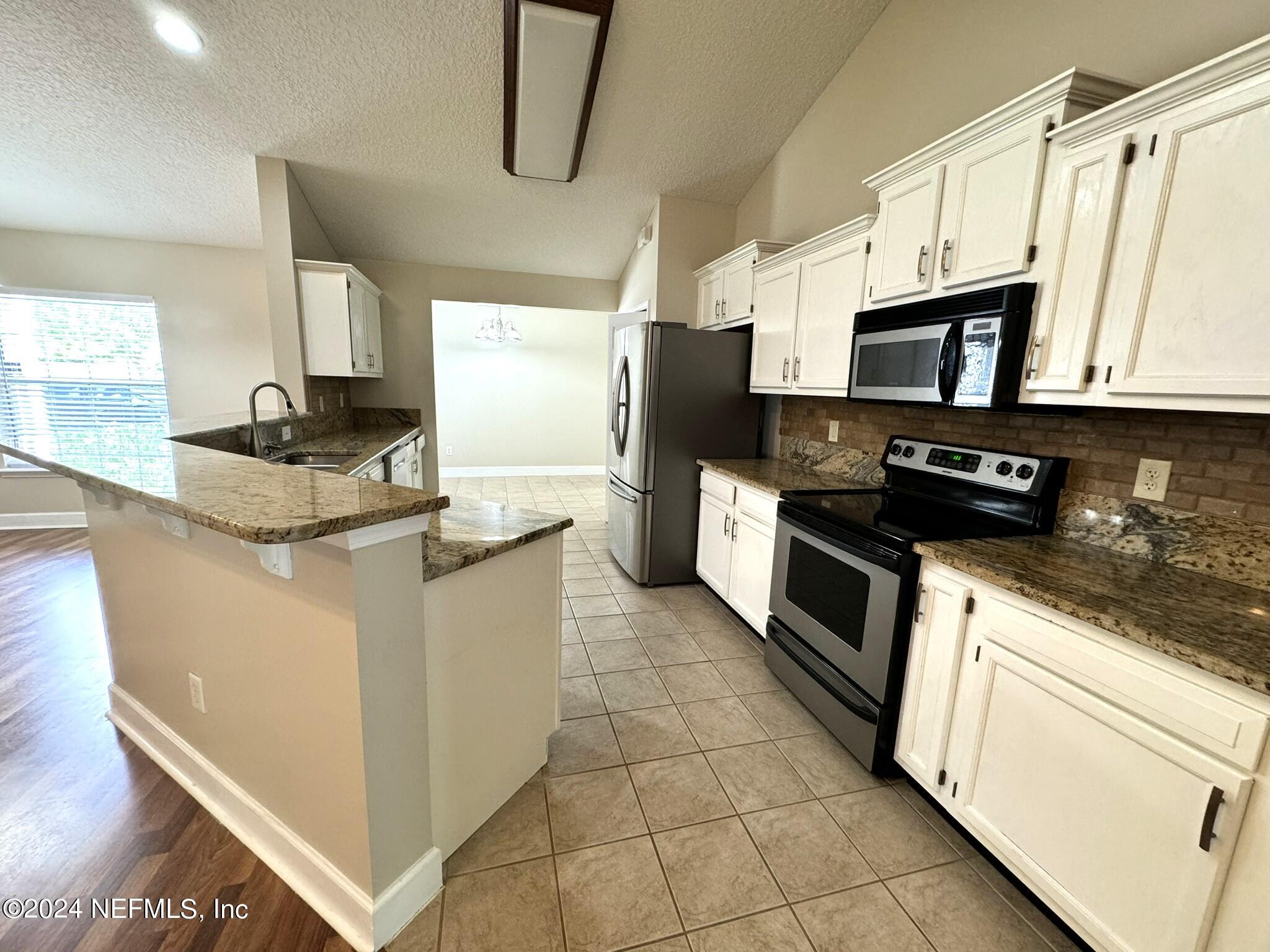 4780 Raggedy Point Road Fleming Island, FL 32003 - Photo 7 of 30 7 Kitchen A