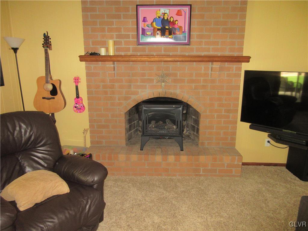 953 Powder Mill Road Bethlehem, PA 18017 - Photo 29 of 33 Brick fireplace w/ propane heater