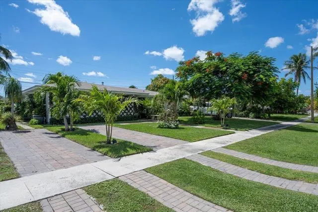a view of a garden with a fountain