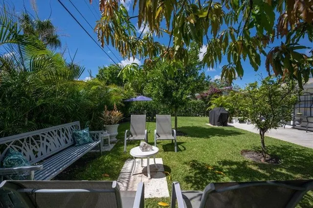 a view of yard with patio