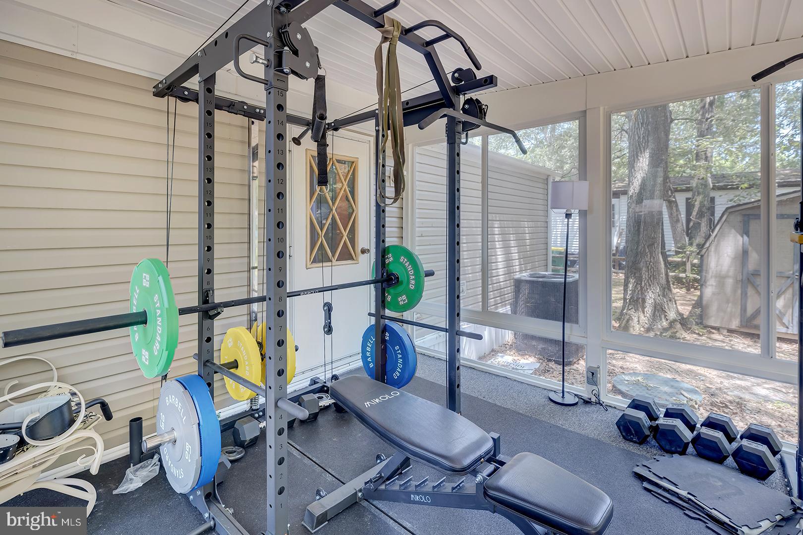 24119 Celtic Street Georgetown, DE 19947 - Photo 23 of 45 a living room filled with furniture