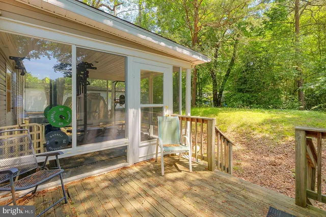 a view of swimming pool with a patio