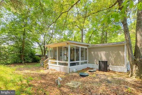 a backyard of house with seating space