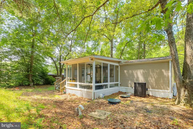 a backyard of house with seating space