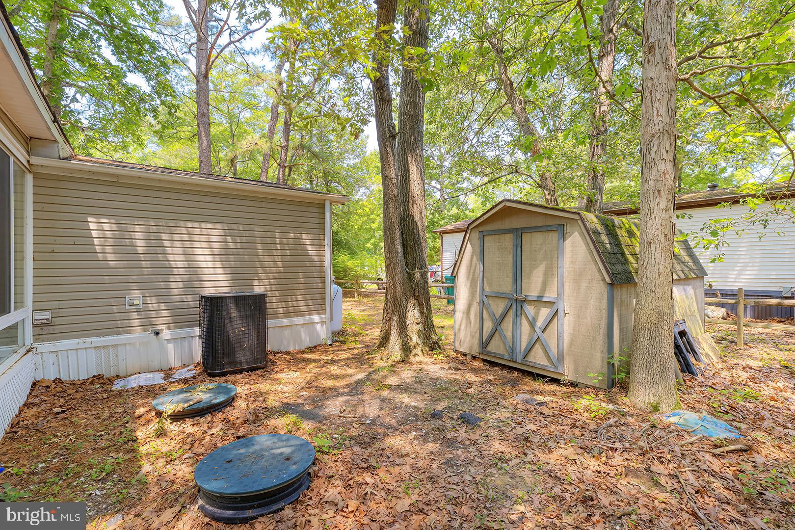 24119 Celtic Street Georgetown, DE 19947 - Photo 33 of 45 a backyard of house with seating space