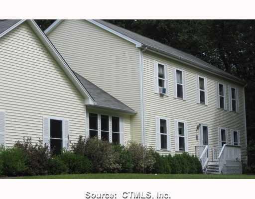 154 Race Hill Road Madison, CT 06443 - Photo 1 of 1 a view of a house with backyard and trees