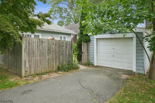 a front view of a house with a garage