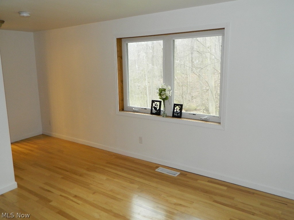 9772 Chardon Road Chardon, OH 44024 - Photo 17 of 35 View of Master BR Walking to the Closet and Bathroom - Great Wooded Views to Enjoy as Well!