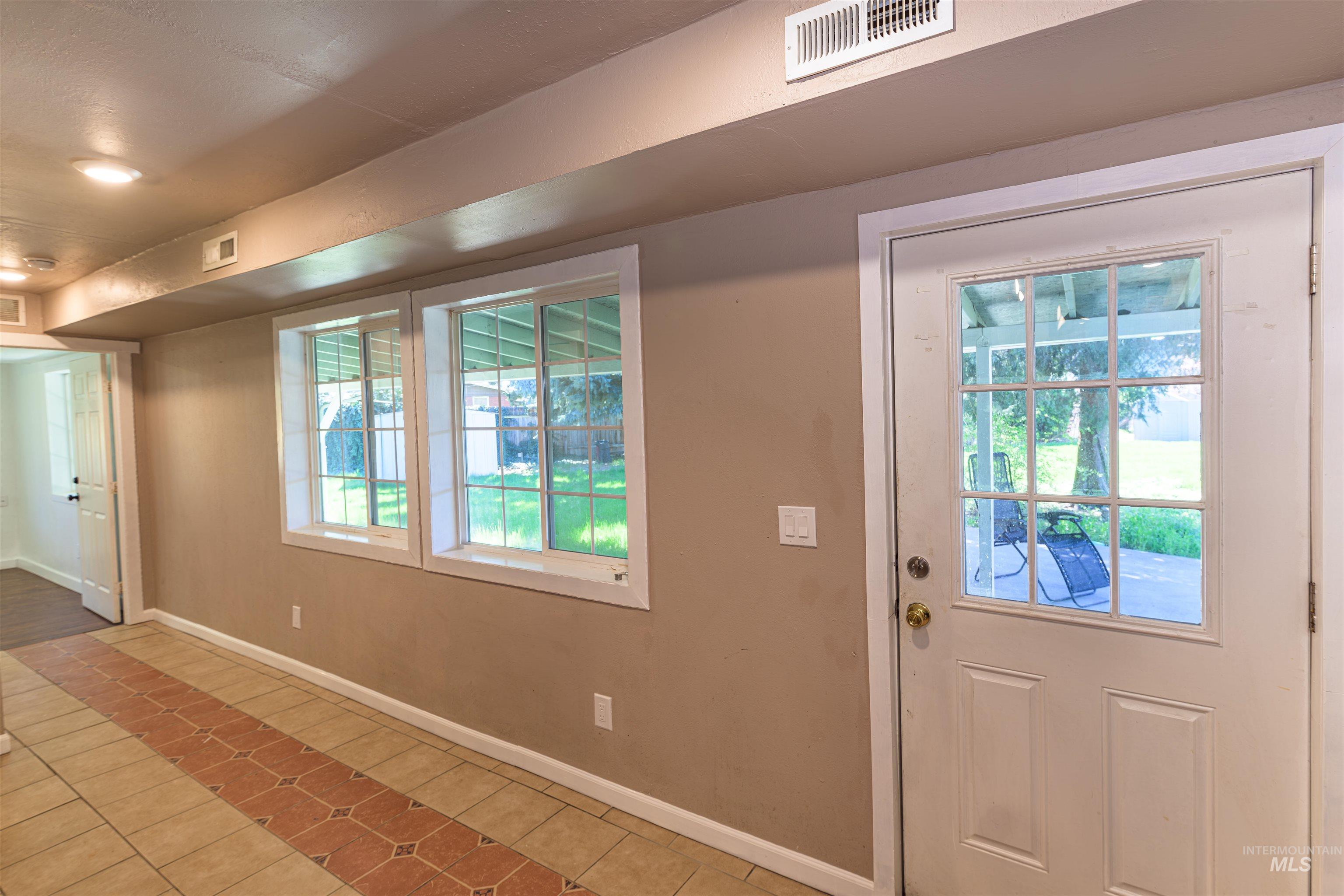 2003 North Cole Road Boise, ID 83704 - Photo 13 of 40 Doorway featuring tile patterned flooring
