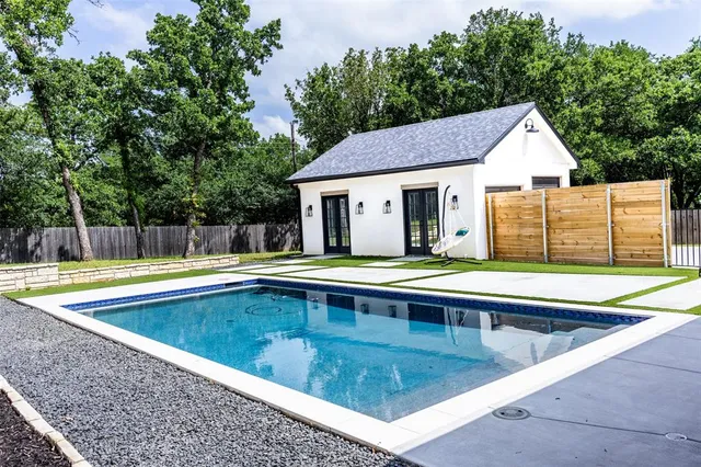 a view of a house with swimming pool