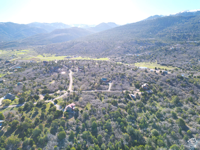 14050 Oak Rdg Circle, Unit 144 Mount Pleasant, UT 84647 - Photo 8 of 28 Aerial view of property and surrounding area featuring a mountainous background
