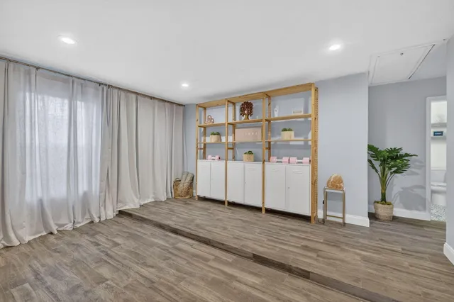 a view of a kitchen with electric appliances