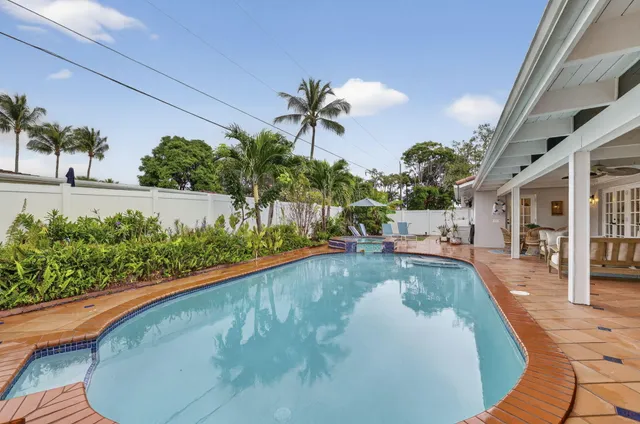 an aerial view of houses with outdoor space
