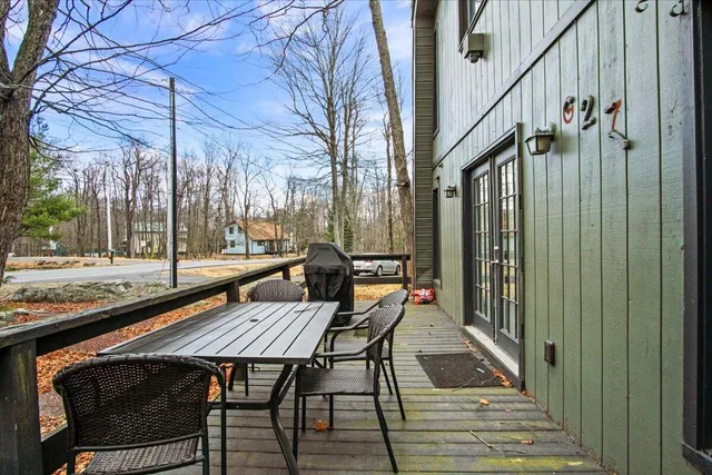 a bathroom with a shower and a sink