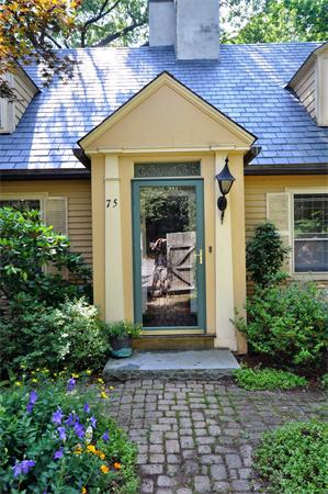75 Blake Road Brookline, MA 02445 - Photo 1 of 21 a front view of a house with garden