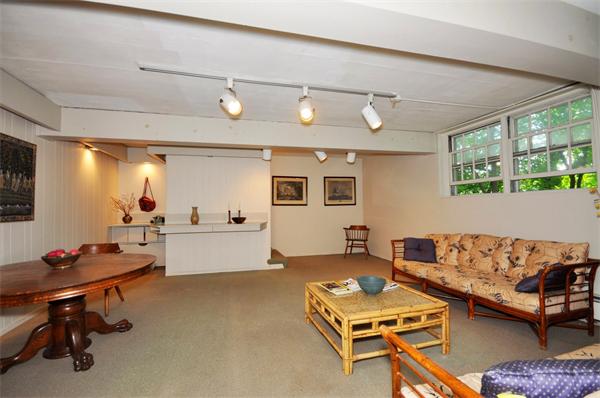 75 Blake Road Brookline, MA 02445 - Photo 16 of 21 a living room with furniture and a window