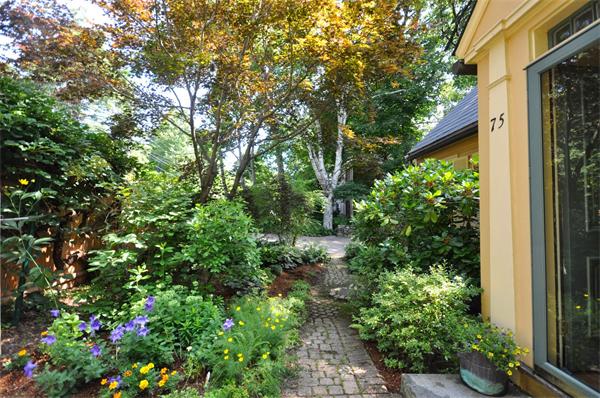 75 Blake Road Brookline, MA 02445 - Photo 2 of 21 a view of a house with a tree