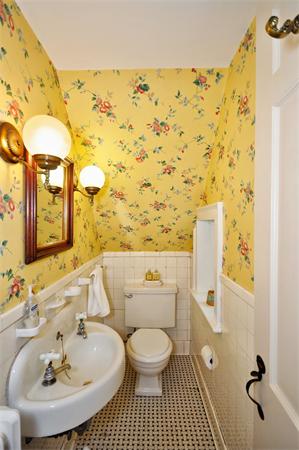 75 Blake Road Brookline, MA 02445 - Photo 10 of 21 a bathroom with a sink and a mirror