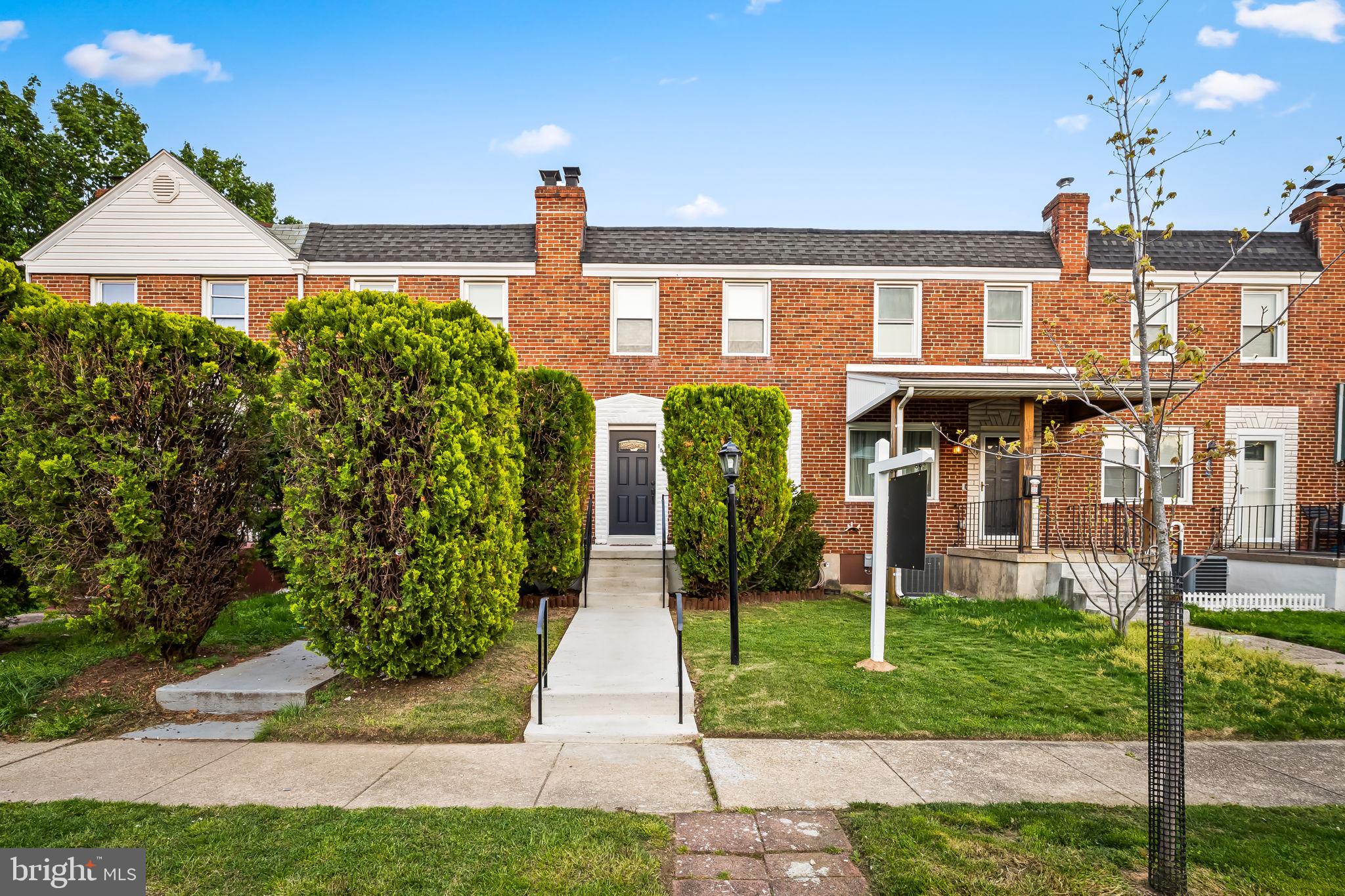 1817 Dunmere Road Baltimore, MD 21222 - Photo 1 of 27 a front view of a house with garden