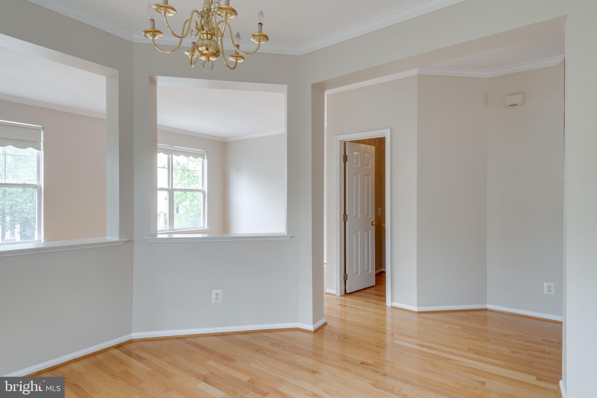 43146 Huntsman Square Broadlands, VA 20148 - Photo 6 of 31 Dining room to living room
