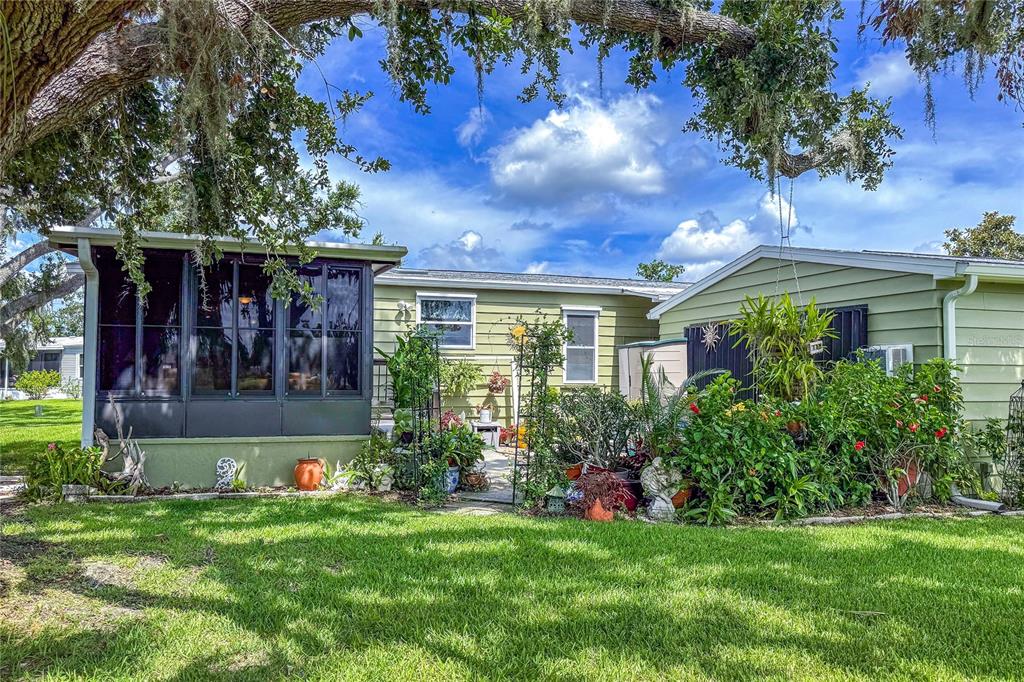 83 Eagle Circle Ellenton, FL 34222 - Photo 48 of 60 a view of a house with garden and a tree