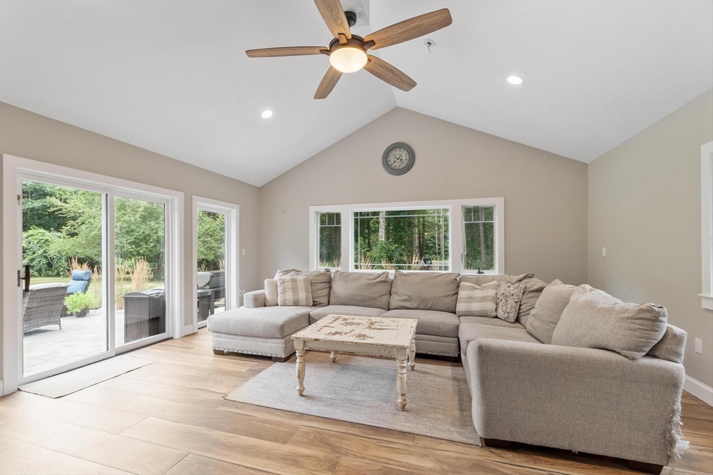 241 Reservoir Road Lunenburg, MA 01462 - Photo 18 of 40 a living room with furniture and a large window