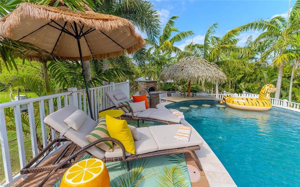 7146 Congdon Road Fort Myers, FL 33908 - Photo 14 of 50 a view of an outdoor sitting area with furniture and backyard