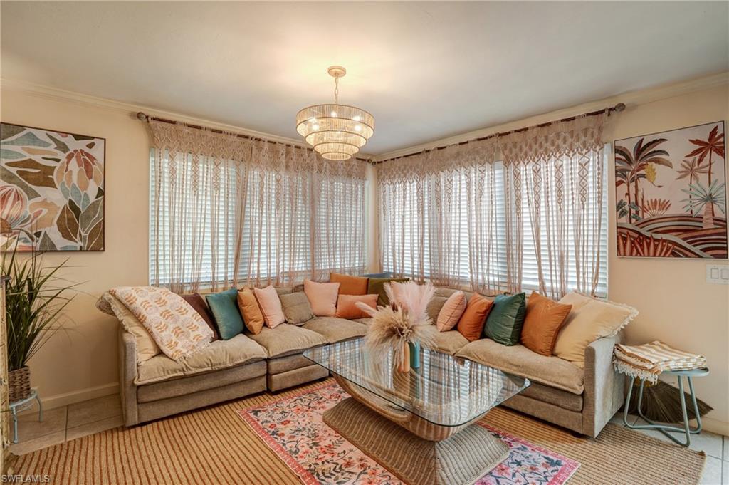 7146 Congdon Road Fort Myers, FL 33908 - Photo 17 of 50 a living room with furniture and a large window