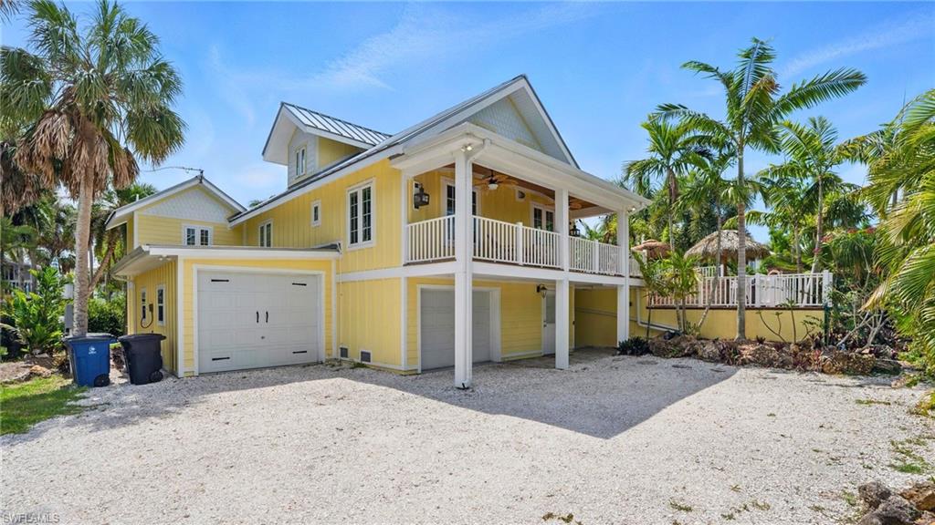 7146 Congdon Road Fort Myers, FL 33908 - Photo 2 of 50 a view of a house with a yard and plants