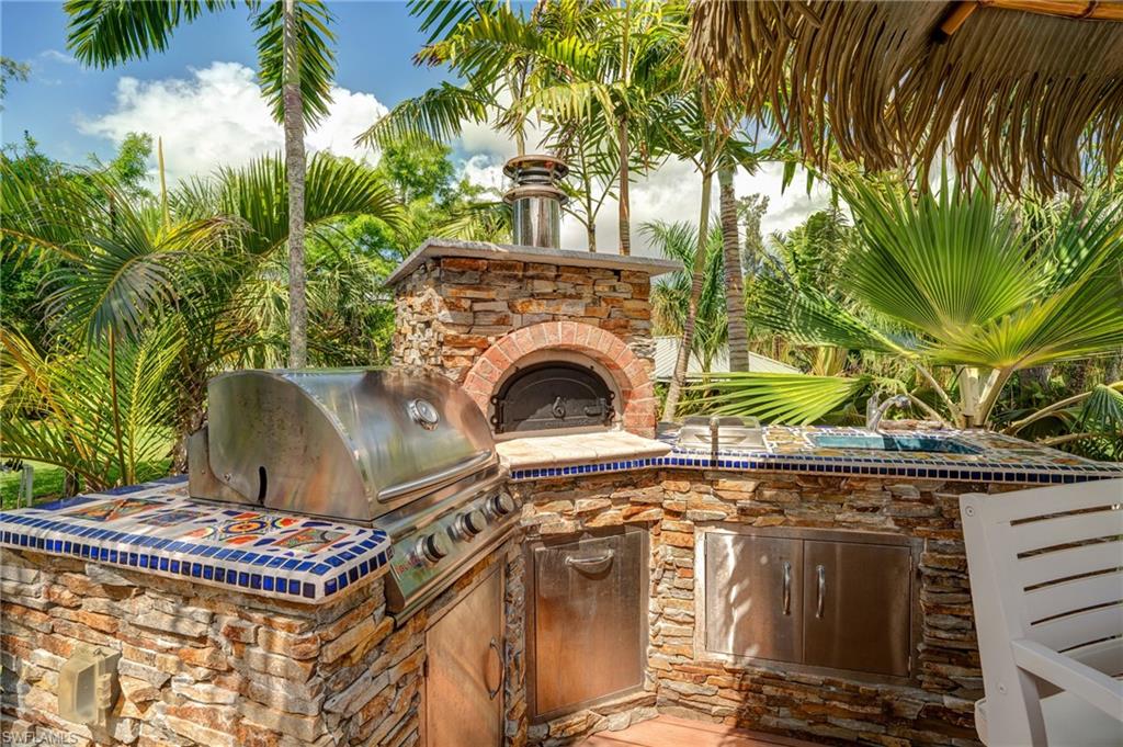 7146 Congdon Road Fort Myers, FL 33908 - Photo 24 of 50 a front view of a house with plants