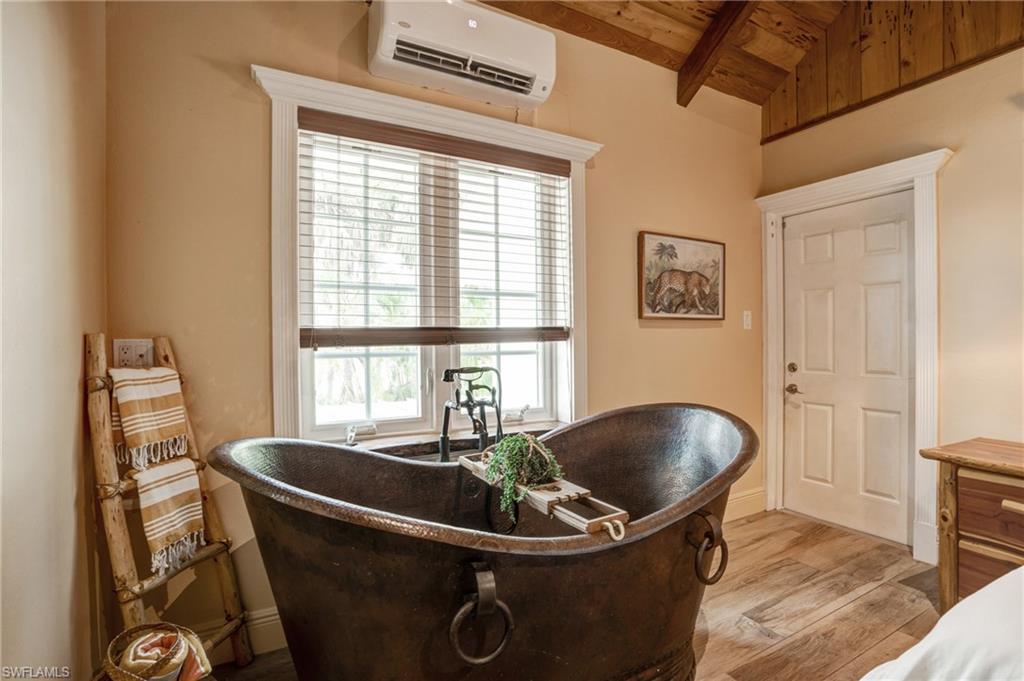 7146 Congdon Road Fort Myers, FL 33908 - Photo 9 of 50 a room with a couch and a table