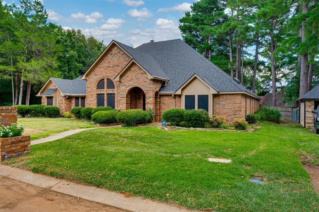 650 Spruce Drive Reno, TX 75462 - Photo 29 of 29 a front view of a house with yard and green space