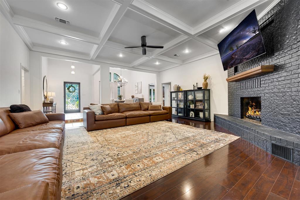 650 Spruce Drive Reno, TX 75462 - Photo 9 of 29 a living room with furniture and a fireplace