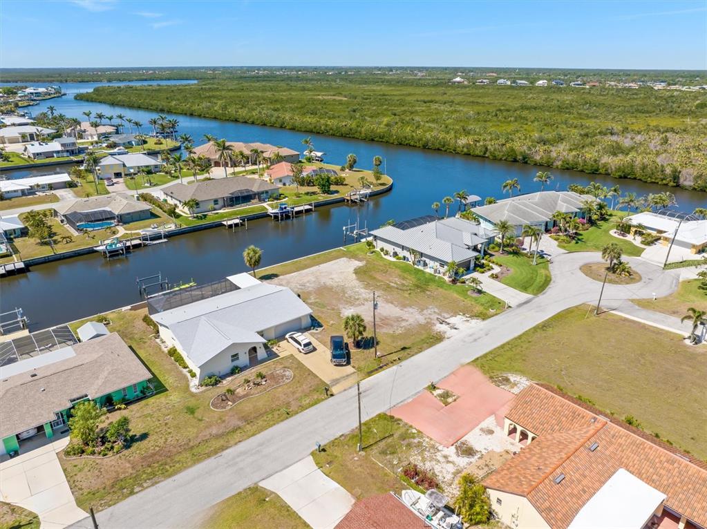 143 Leland Street Southwest Port Charlotte, FL 33952 - Photo 2 of 18 an aerial view of a house with a ocean view