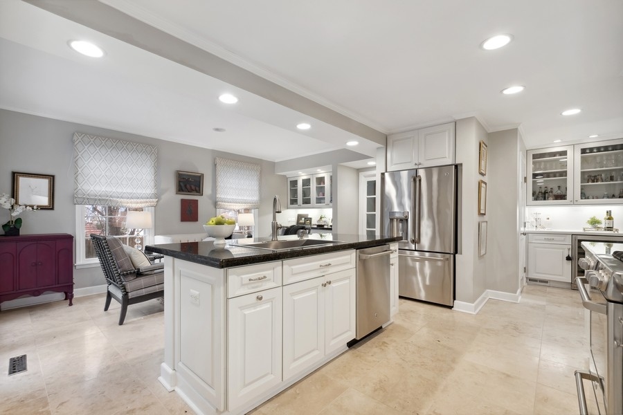 567 Rosemary Road Lake Forest, IL 60045 - Photo 13 of 42 a kitchen with stainless steel appliances granite countertop a refrigerator and a stove top oven