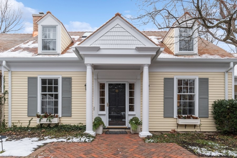 567 Rosemary Road Lake Forest, IL 60045 - Photo 2 of 42 a front view of a house with garden