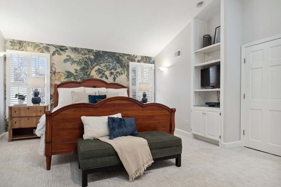 567 Rosemary Road Lake Forest, IL 60045 - Photo 23 of 42 a bedroom with a bed couch and a window