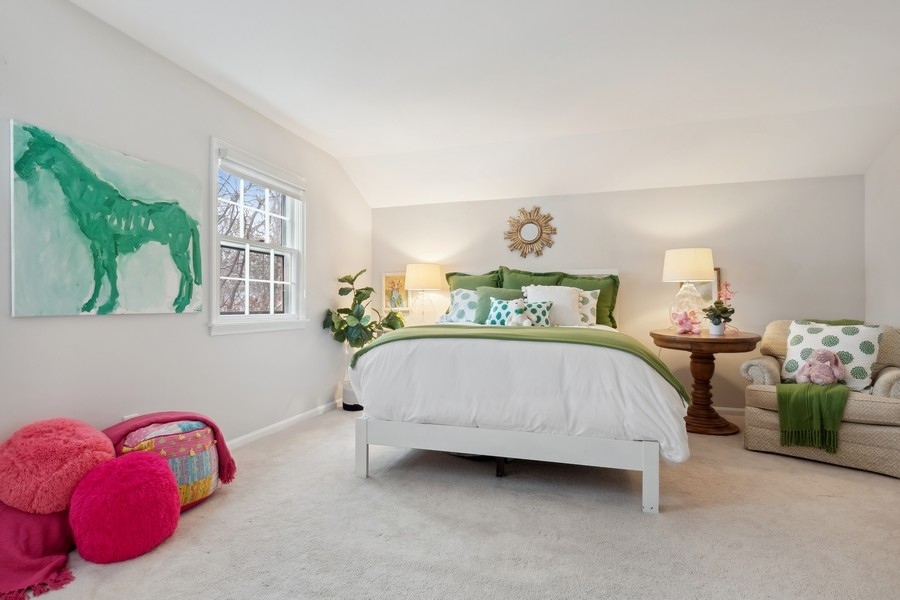 567 Rosemary Road Lake Forest, IL 60045 - Photo 26 of 42 a bedroom with a bed and a window