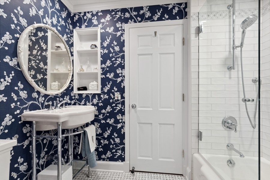 567 Rosemary Road Lake Forest, IL 60045 - Photo 28 of 42 a bathroom with a sink toilet and shower