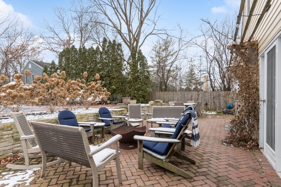 567 Rosemary Road Lake Forest, IL 60045 - Photo 35 of 42 a view of a patio with a table and chairs