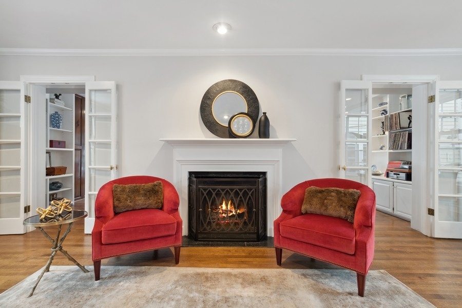 567 Rosemary Road Lake Forest, IL 60045 - Photo 8 of 42 a living room with furniture and a fireplace
