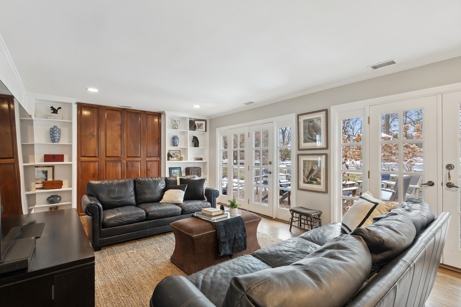 567 Rosemary Road Lake Forest, IL 60045 - Photo 9 of 42 a living room with furniture and a floor to ceiling window