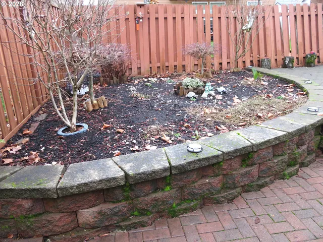 a view of a backyard of the house